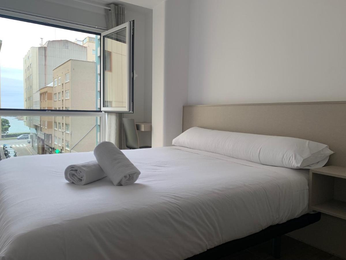 Oxford Suites Ciudad De Lโอโกรูญา ภายนอก รูปภาพ