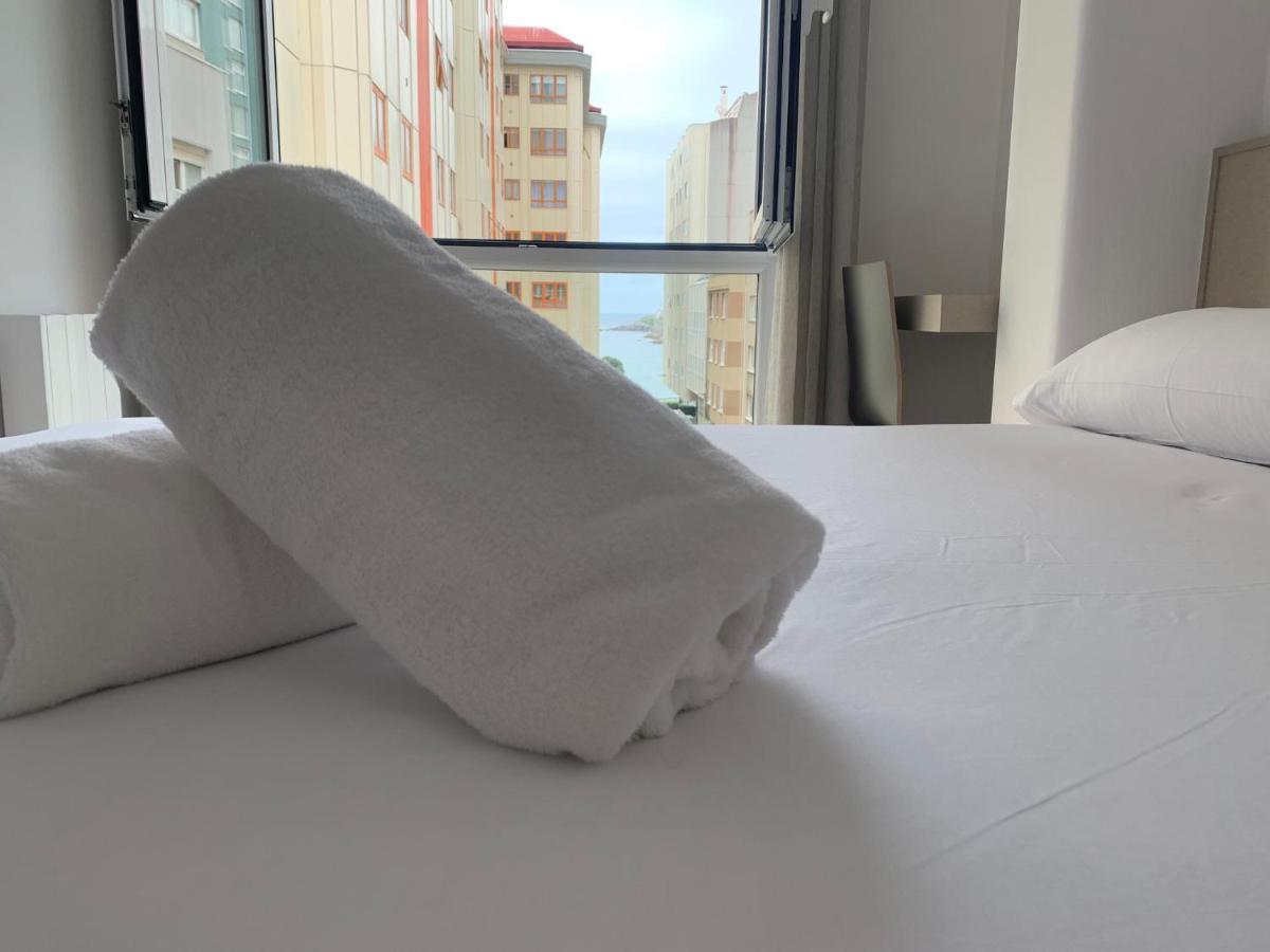 Oxford Suites Ciudad De Lโอโกรูญา ภายนอก รูปภาพ