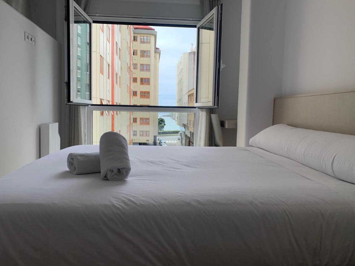 Oxford Suites Ciudad De Lโอโกรูญา ภายนอก รูปภาพ